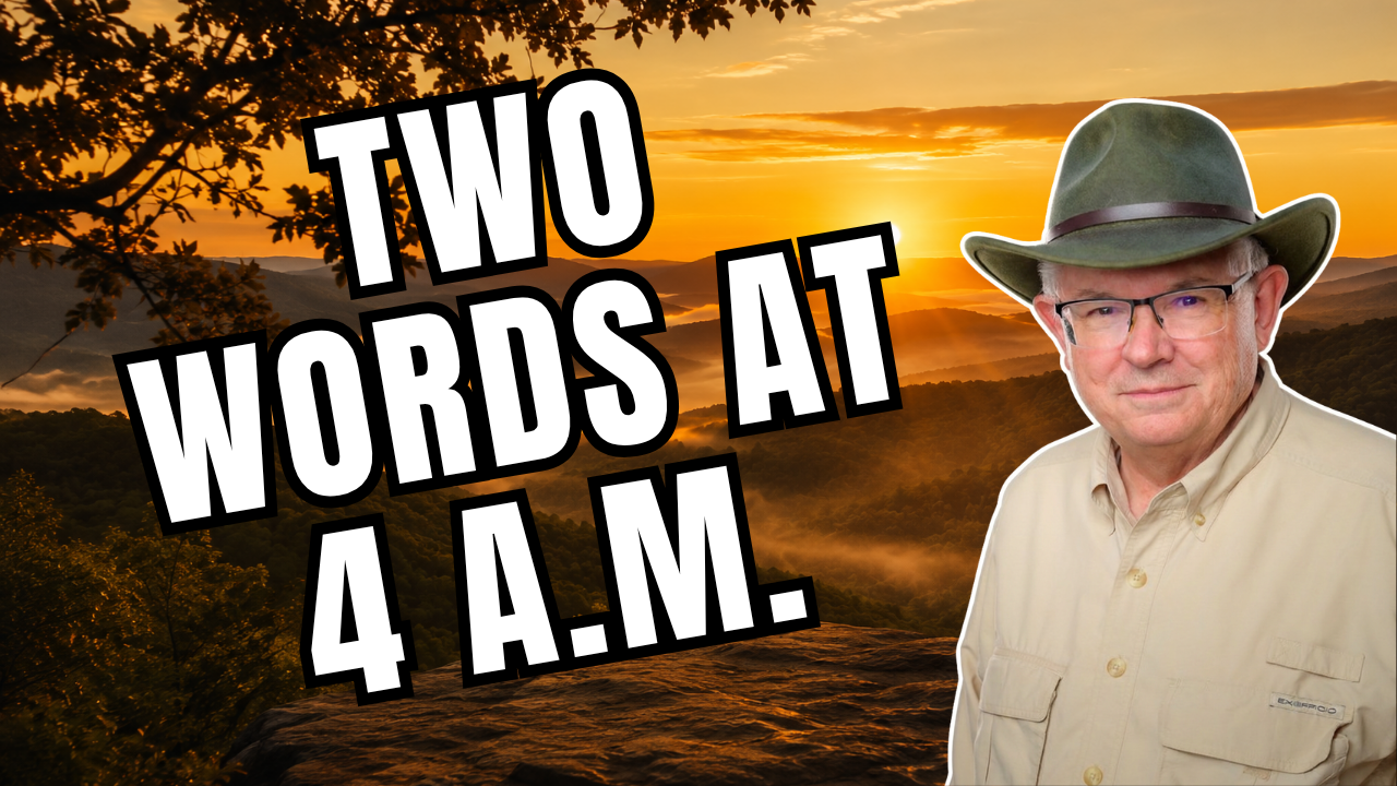 Kelly Smith at sunrise over misty mountains with the words Two Words at 4 A.M.